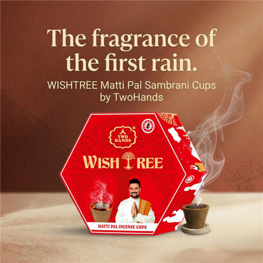 WISHTREE Matti Pal Sambrani Cups box with incense cup emitting fragrant smoke, on a soft brown background.