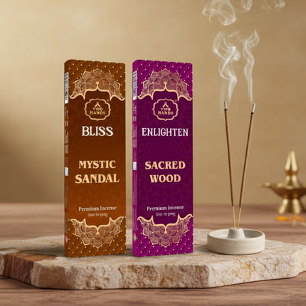 Mystic Sandal and Sacred Wood premium incense sticks with holder and smoke on stone slab