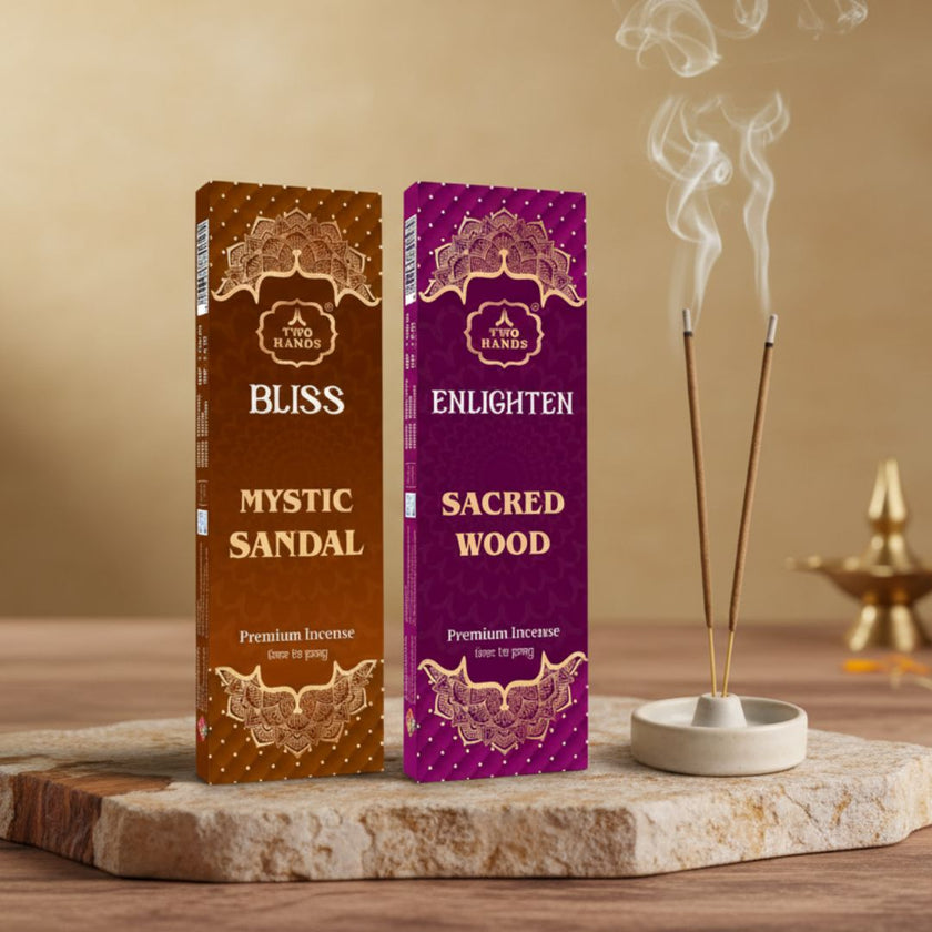 Mystic Sandal and Sacred Wood premium incense sticks with holder and smoke on stone slab